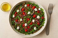 Recept: Lauwe linzensalade met geitenkaas en koolzaadolie